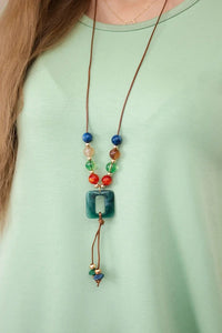 Dress with pendant A2530 / – Pistachio цвет / color | Lexline Fashion