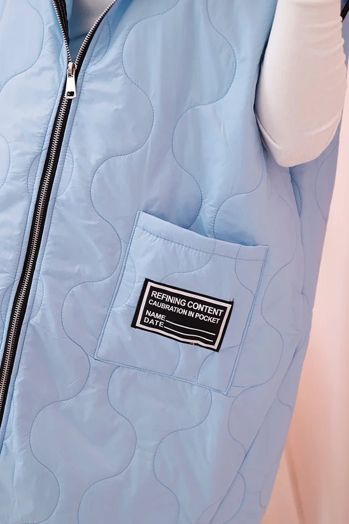 Plus Size women's quilted vest with a hood fastened with a zipper 5393 / – Blue цвет / color | Lexline Fashion