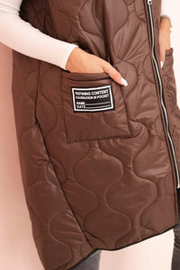 Plus Size women's quilted vest with a hood fastened with a zipper 5393 / – Brown цвет / color | Lexline Fashion