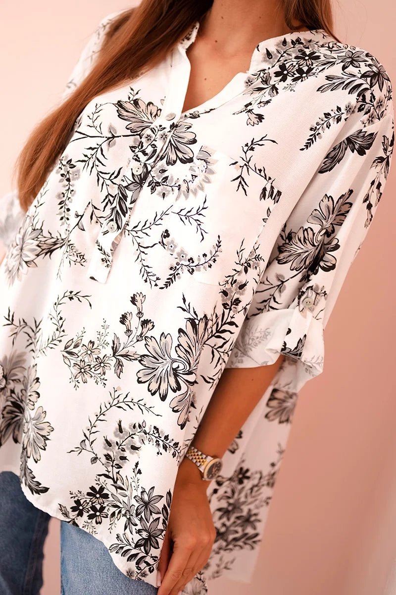 Women's V - neck shirt with a floral pattern ART2696 / – Black цвет / color | Lexline Fashion